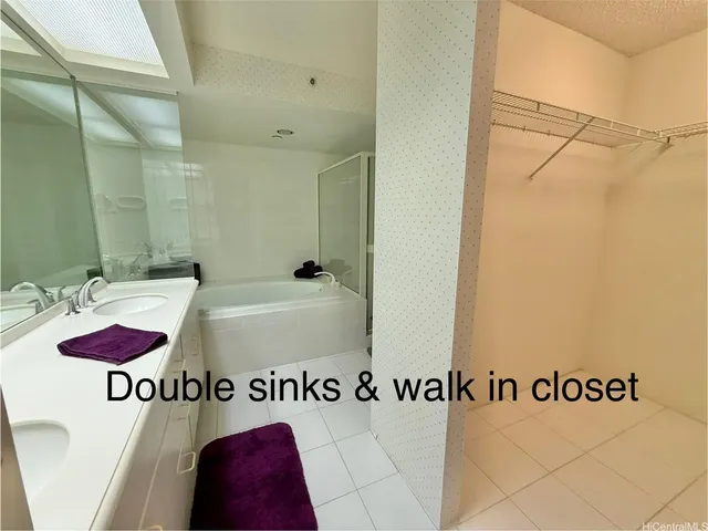 a view of a bathroom with a bathtub