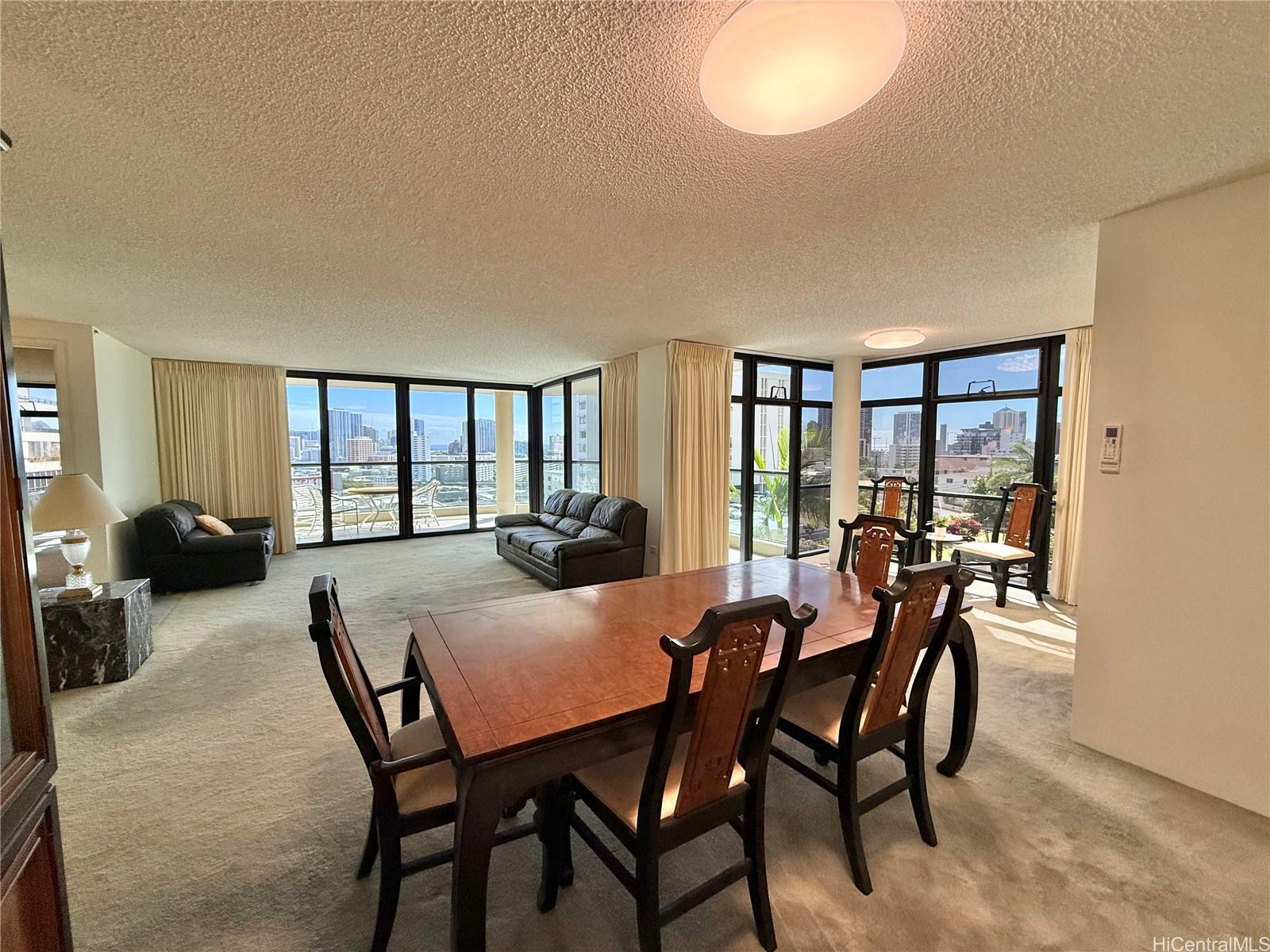 1015 Wilder Avenue, Unit 503 Honolulu, HI 96822 - Photo 3 of 17 Spacious dining, living room, wrap around lanai.