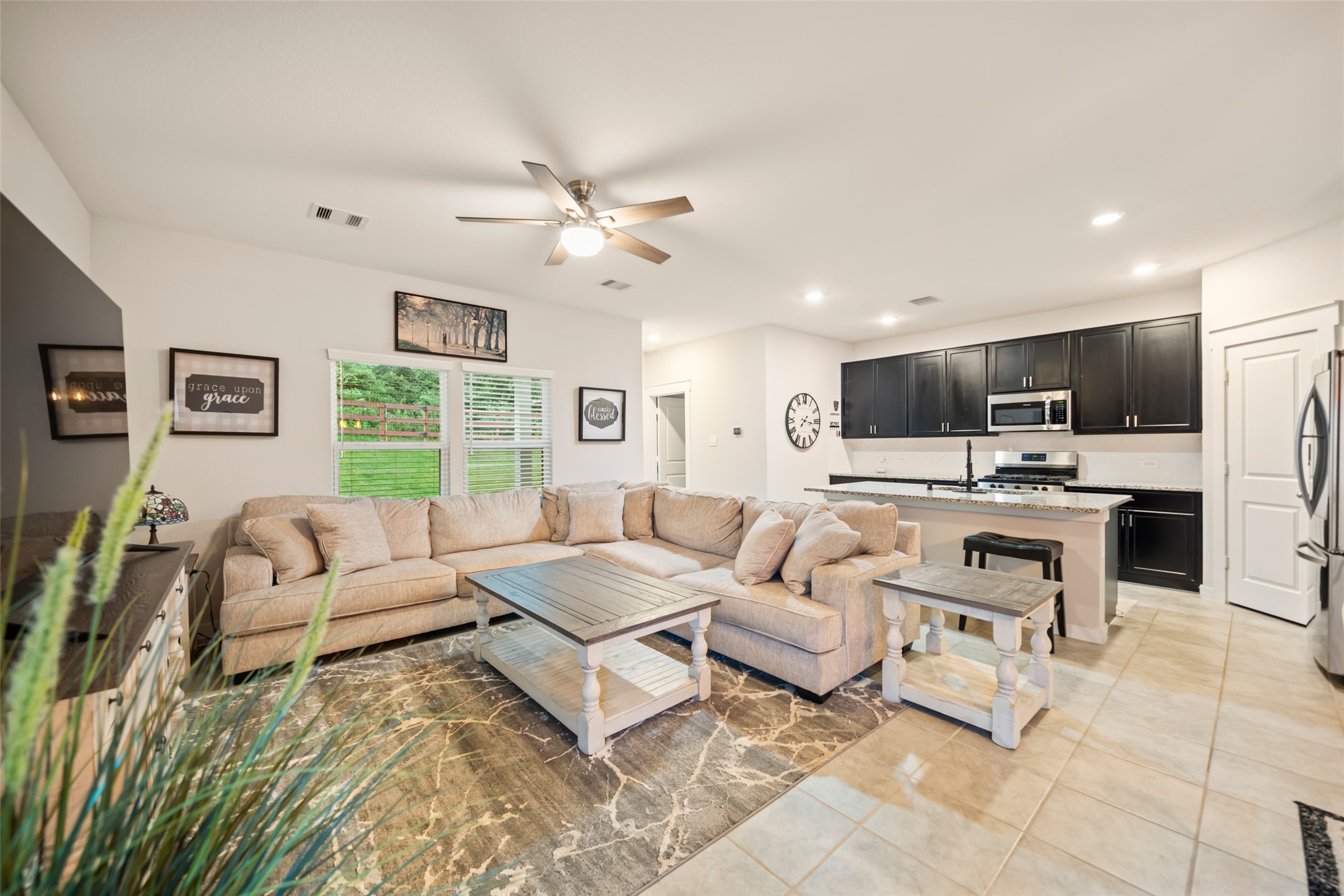 12158 Mustang Avenue Willis, TX 77378 - Photo 15 of 36 a living room with furniture kitchen view and a window