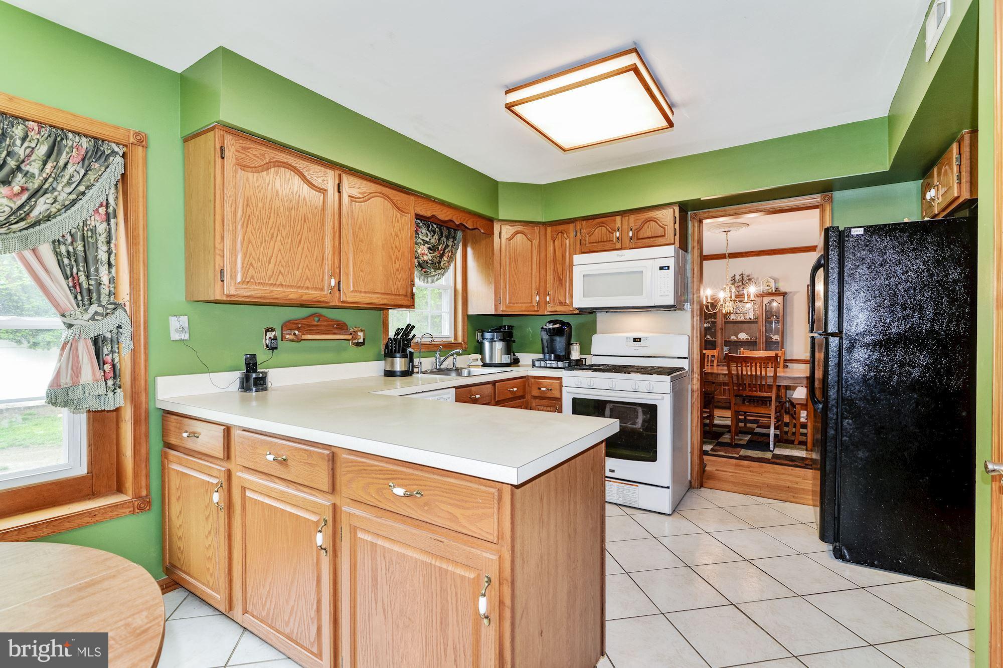 107 Timber Boulevard Brooklawn, NJ 08030 - Photo 13 of 33 Kitchen & Entrance to Formal Dining Room