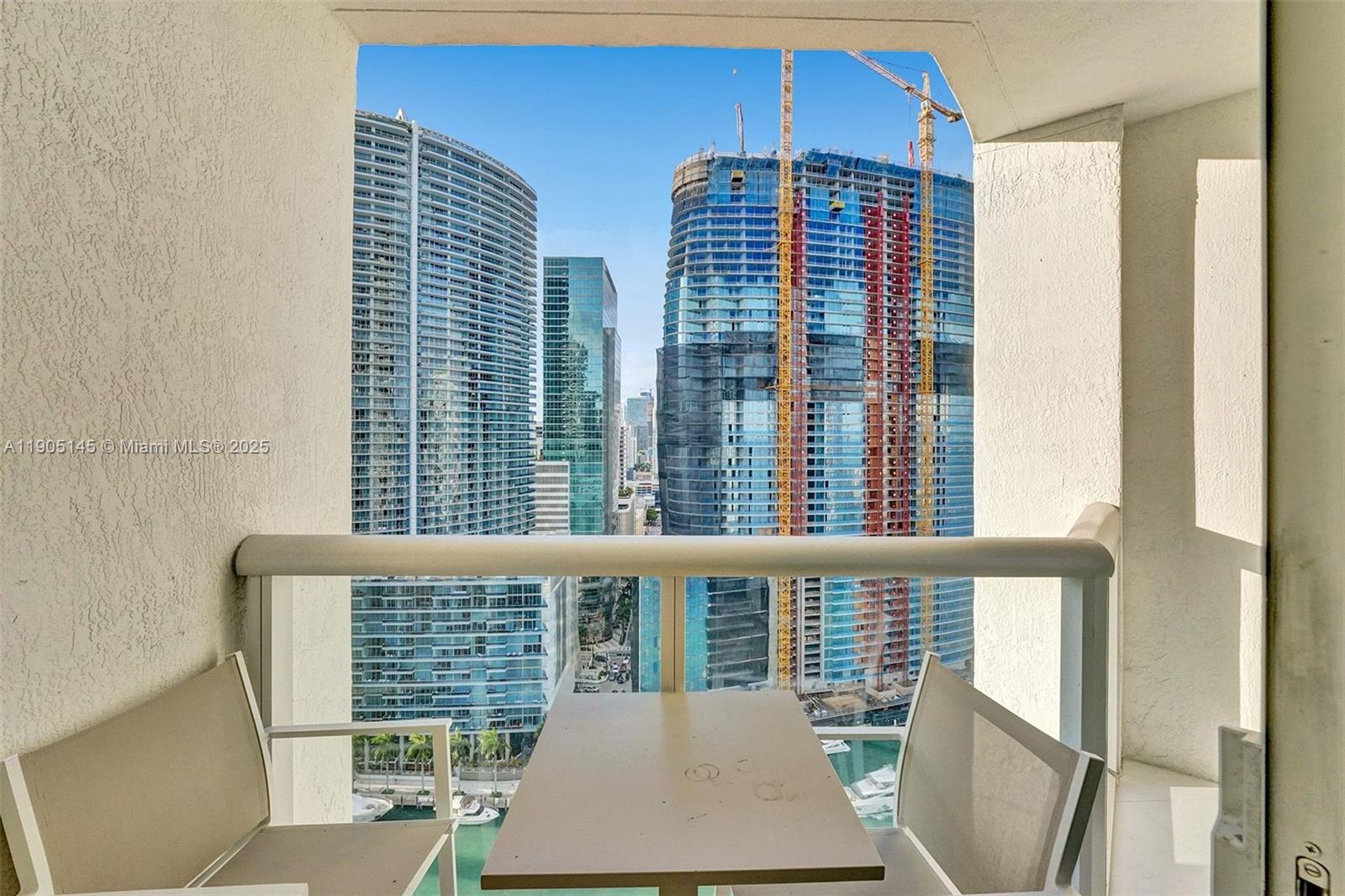 475 Brickell Avenue, Unit 2708 Miami, FL 33131 - Photo 15 of 20 a view of balcony with a large window