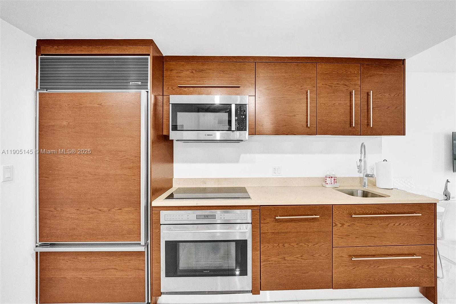 475 Brickell Avenue, Unit 2708 Miami, FL 33131 - Photo 6 of 20 a bathroom with a sink and a mirror