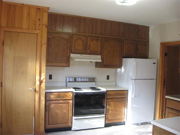 64 Worcester Road Westminster, MA 01473 - Photo 13 of 24 a kitchen with a refrigerator sink and cabinets