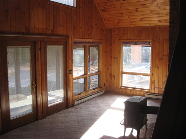 64 Worcester Road Westminster, MA 01473 - Photo 4 of 24 a view of a livingroom with wooden floor and a window
