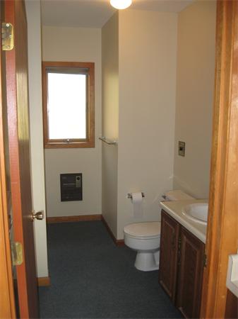 64 Worcester Road Westminster, MA 01473 - Photo 10 of 24 a bathroom with a toilet sink and a mirror
