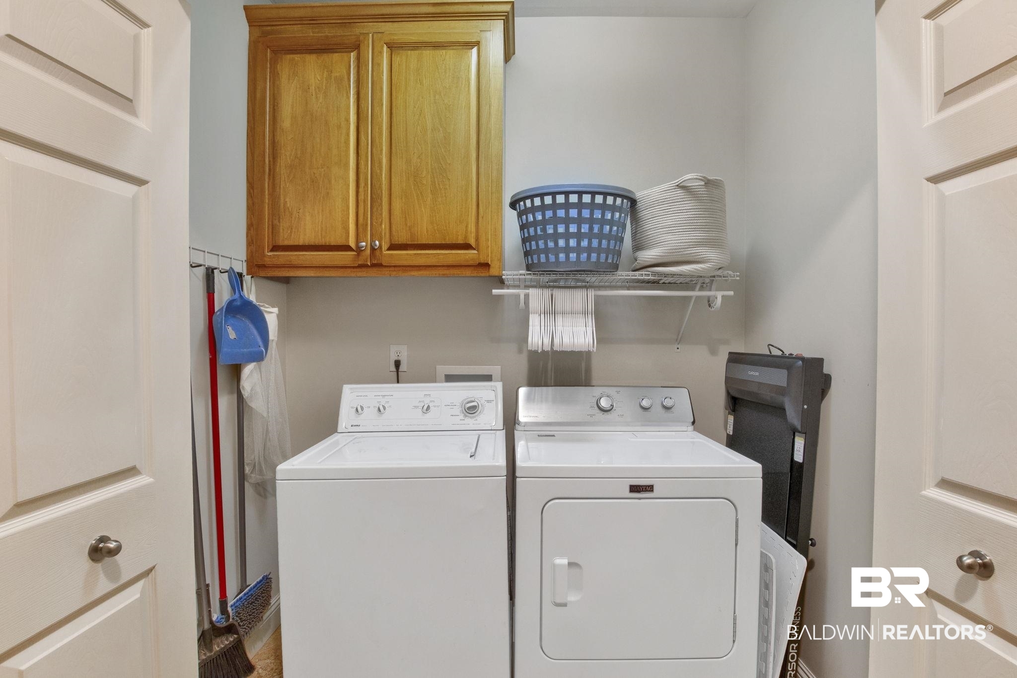 9478 Autauga Bend Daphne, AL 36526 - Photo 62 of 73 Washroom with cabinets and independent washer and dryer