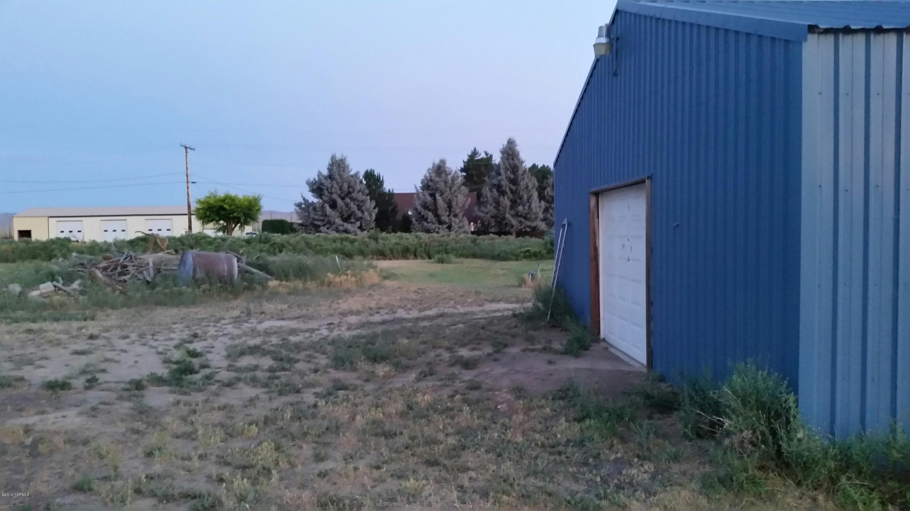 4991 Harrah Road Wapato, WA 98951 - Photo 8 of 9 a view of a backyard