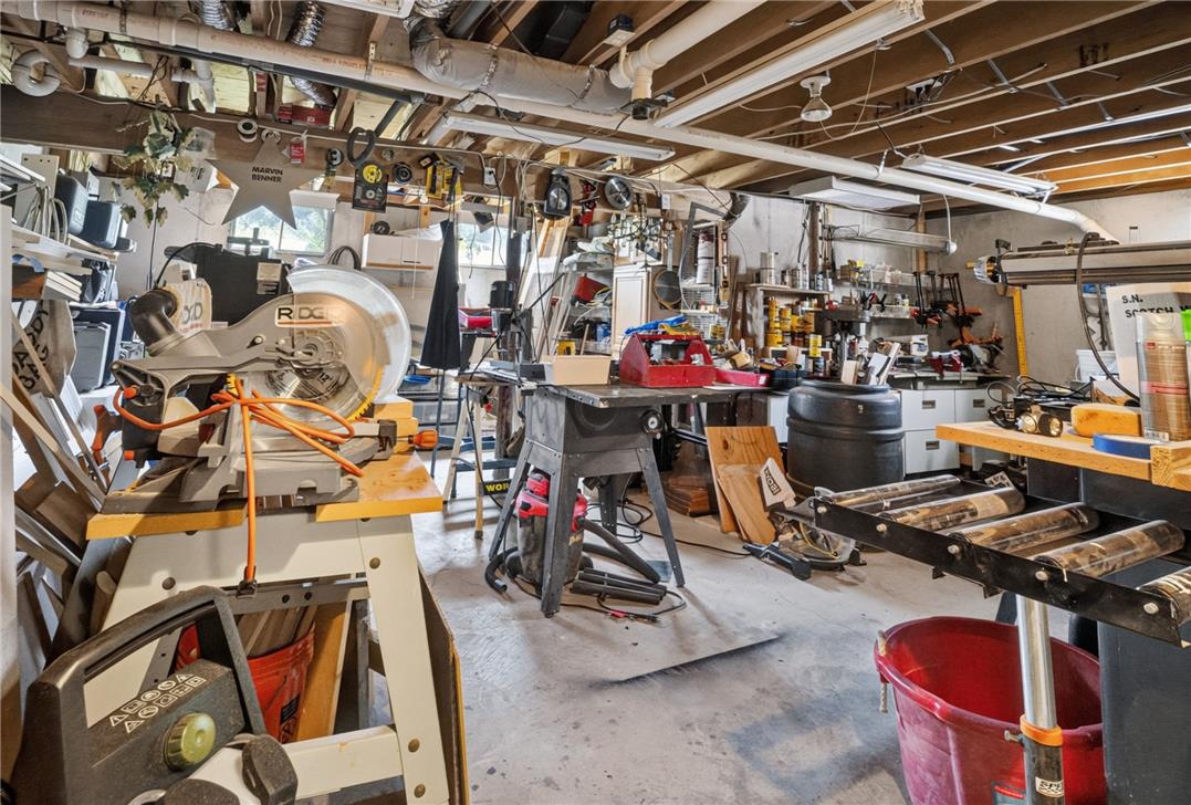 6467 Abbey Road Wind Gap, PA 18091 - Photo 44 of 46 A well-equipped workshop space offers ample room for projects and storage.