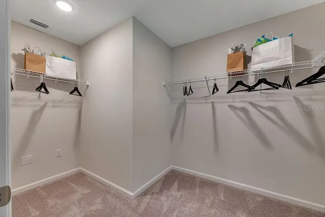 a view of a room with racks on the wall