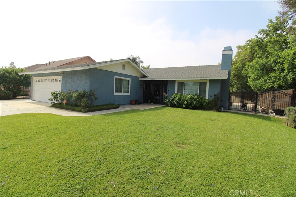 10113 Devon Street Rancho Cucamonga, CA 91730 - Photo 3 of 37 a view of outdoor space yard and front view of house