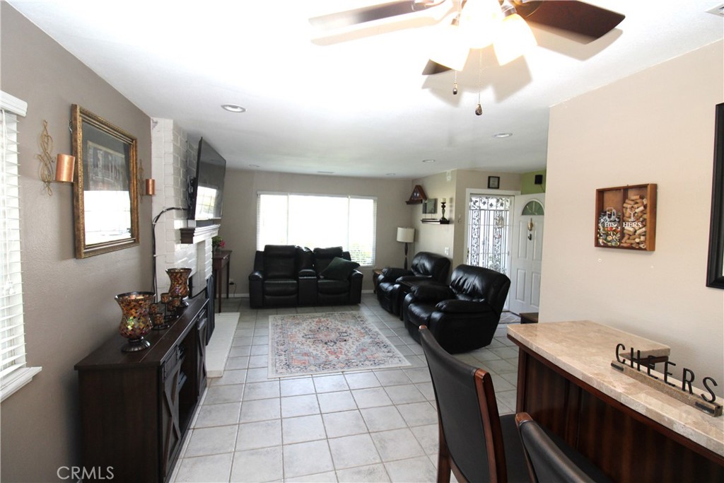 10113 Devon Street Rancho Cucamonga, CA 91730 - Photo 6 of 37 a living room with furniture