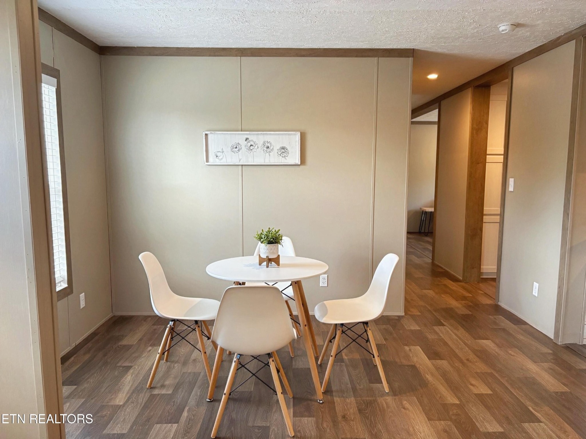 4501 Shipe Road Corryton, TN 37721 - Photo 11 of 32 a view of a dining room with furniture and wooden floor