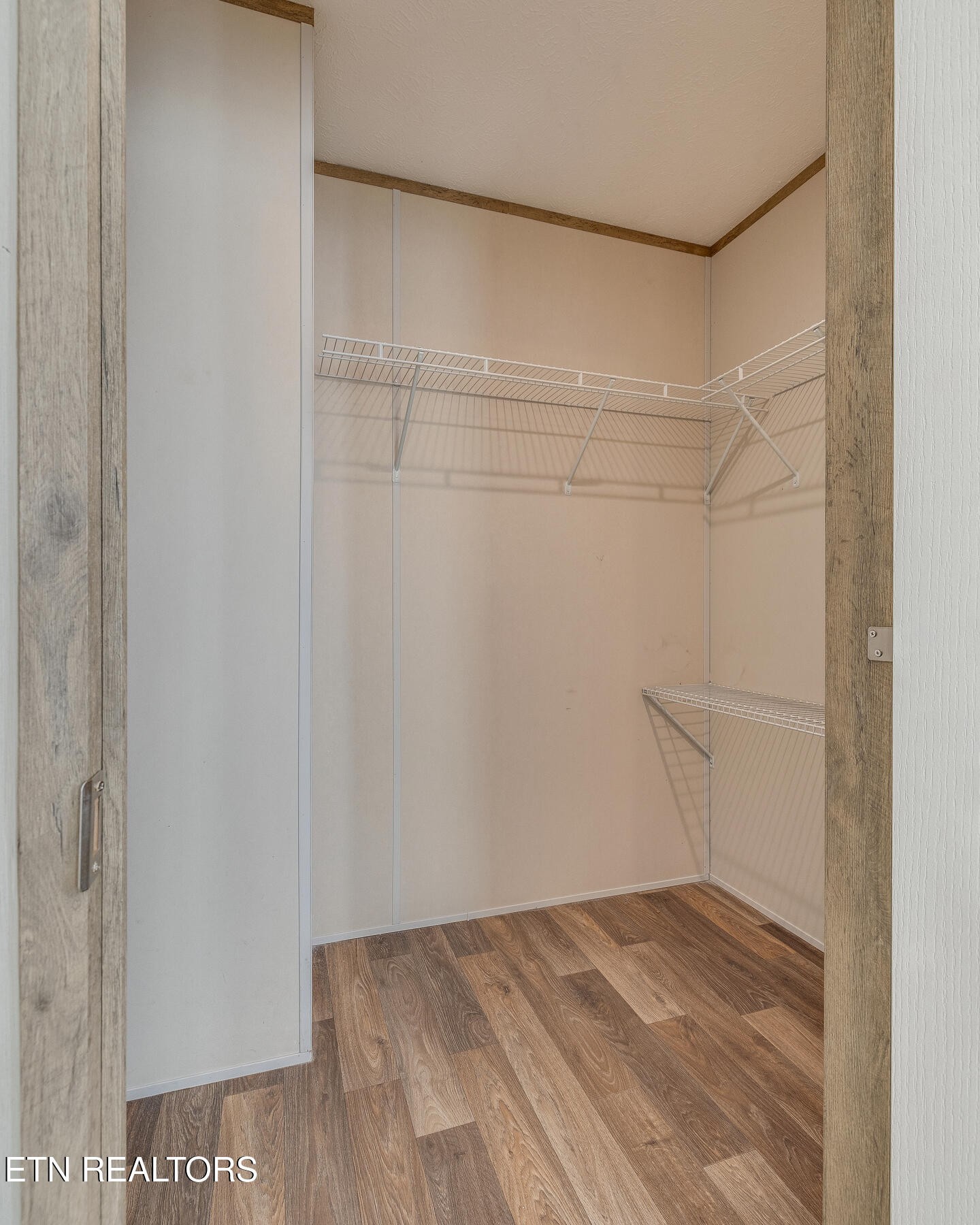 4501 Shipe Road Corryton, TN 37721 - Photo 16 of 32 a view of a room with racks on the wall