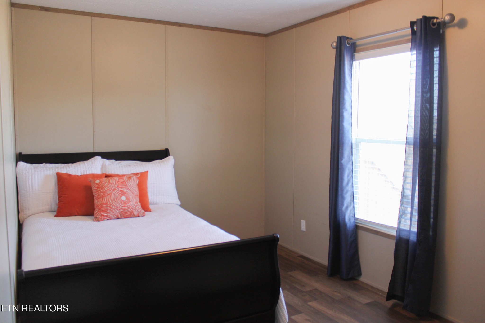 4501 Shipe Road Corryton, TN 37721 - Photo 18 of 32 a bedroom with a bed and a window