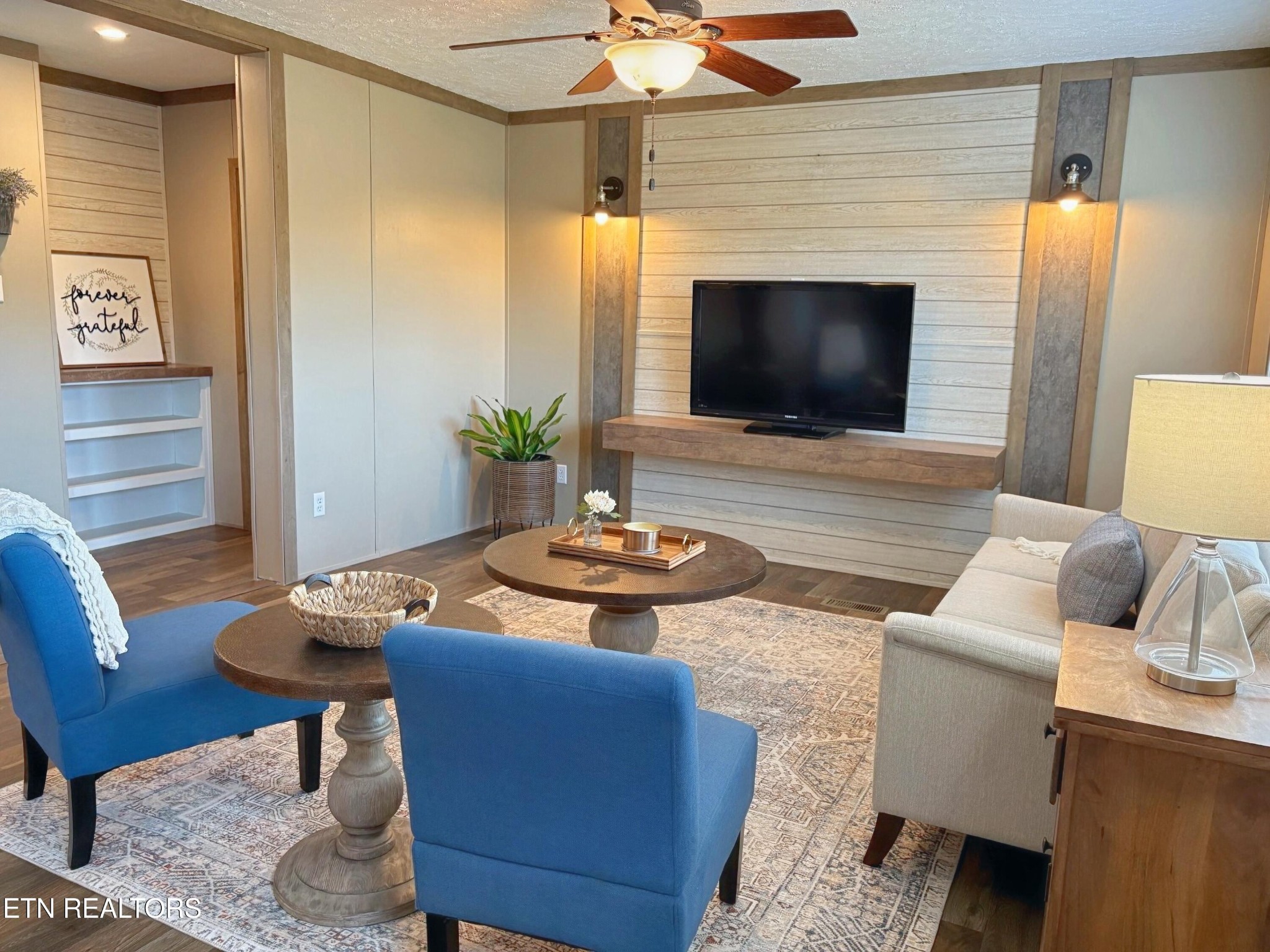 4501 Shipe Road Corryton, TN 37721 - Photo 2 of 32 a living room with furniture and a flat screen tv