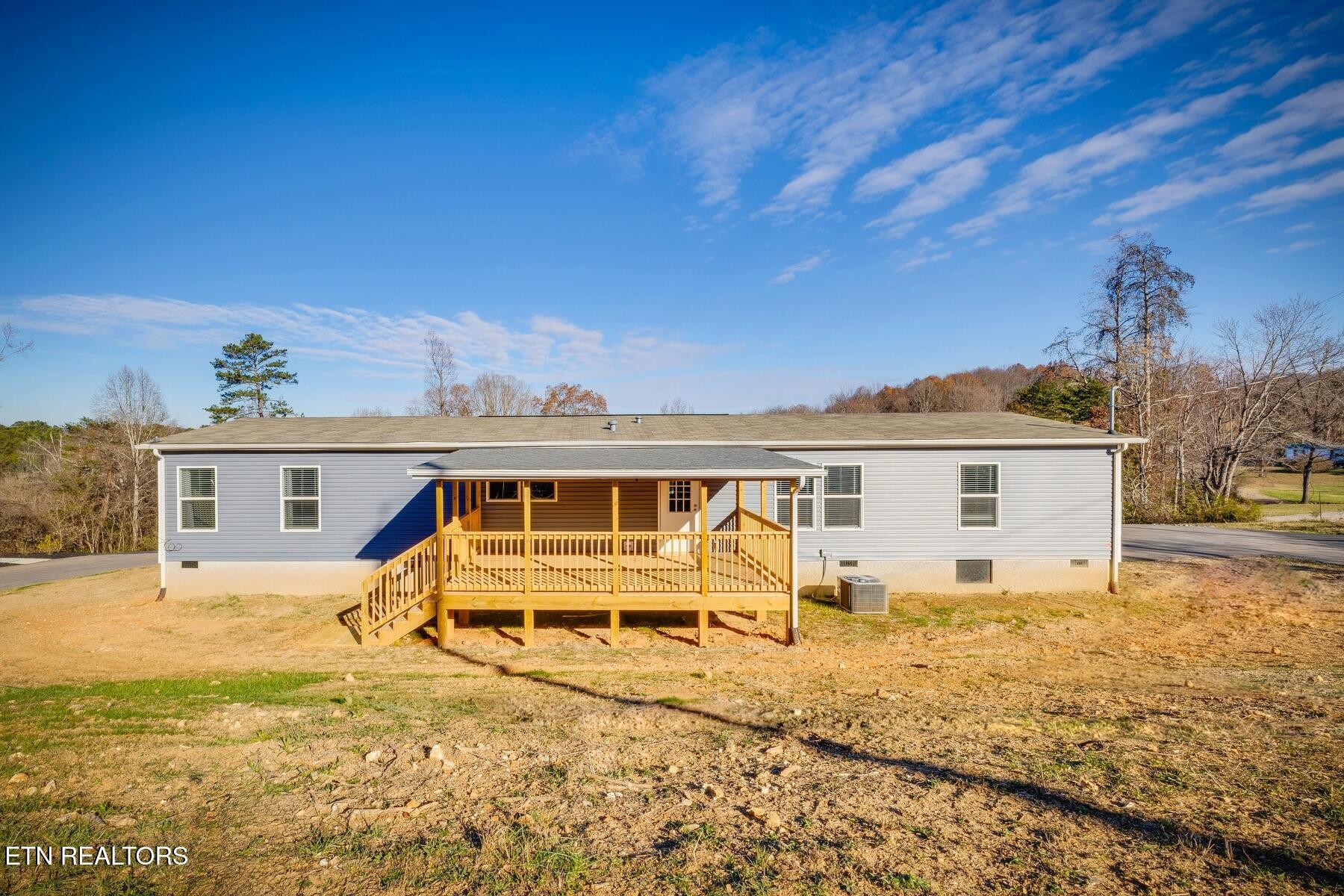 4501 Shipe Road Corryton, TN 37721 - Photo 27 of 32 front view of a house with a yard
