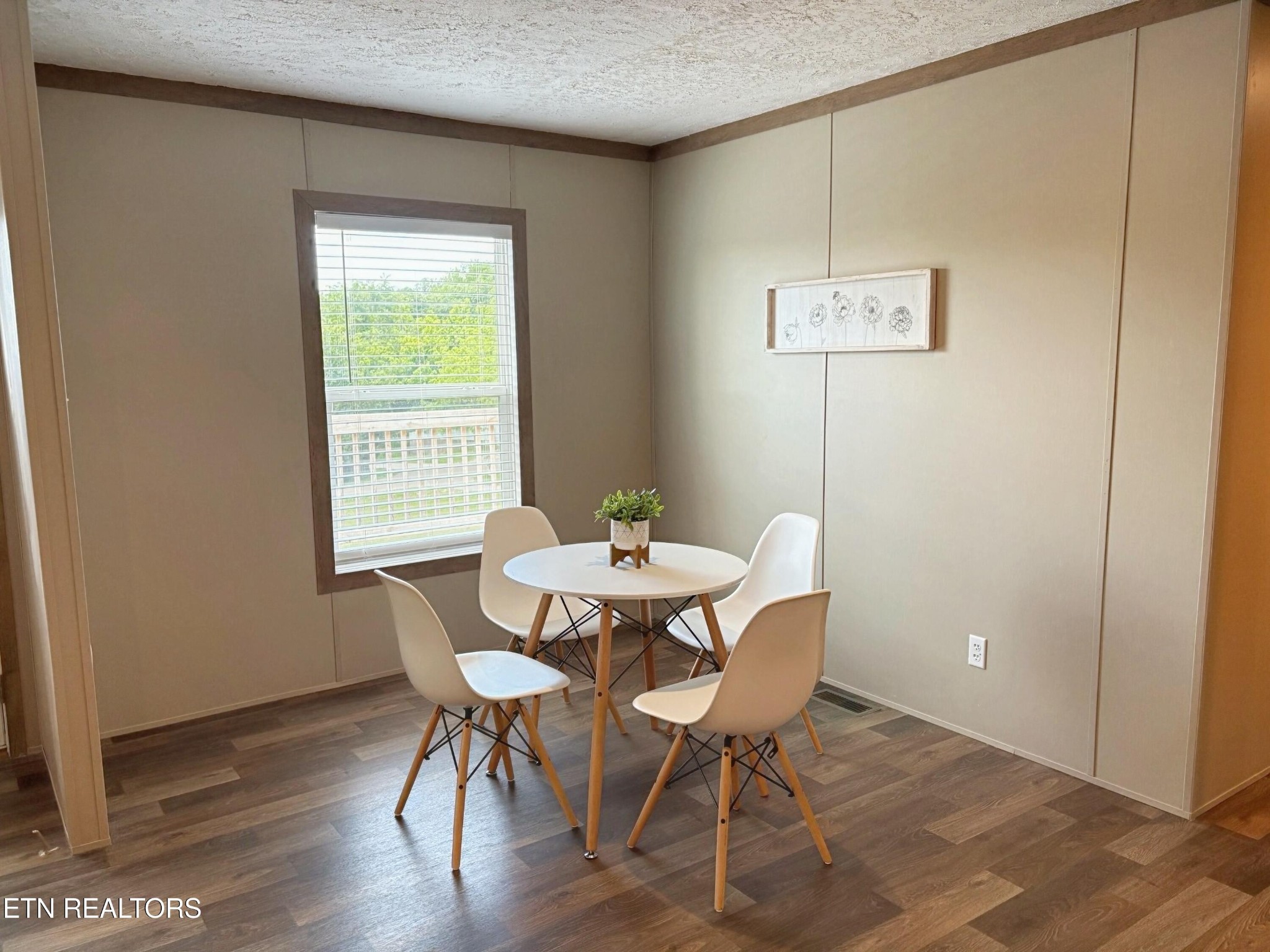 4501 Shipe Road Corryton, TN 37721 - Photo 10 of 32 a view of a dining room with furniture and wooden floor