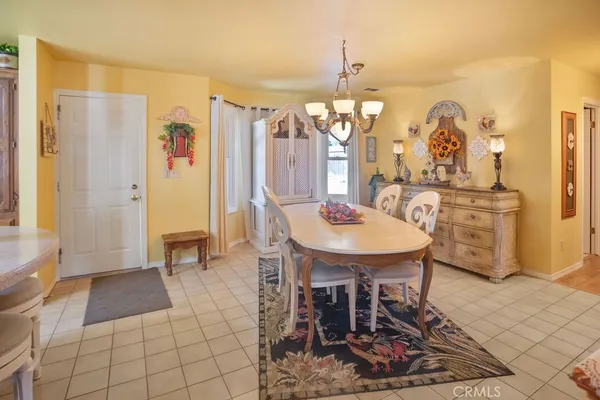 a view of a a dining room with furniture