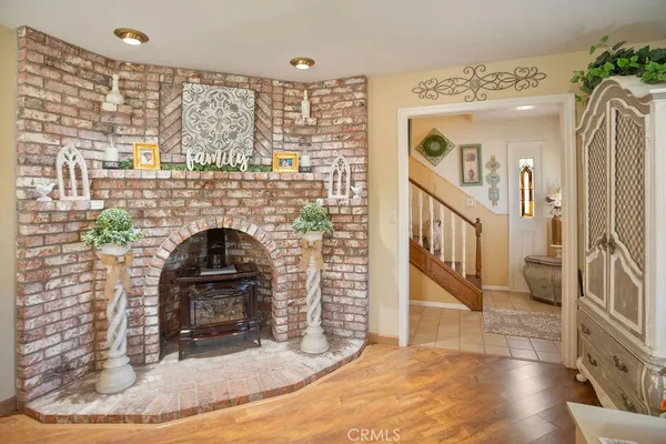 a view of a livingroom with furniture and a fireplace