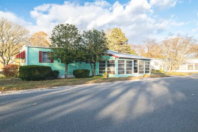 a view of a house with a street