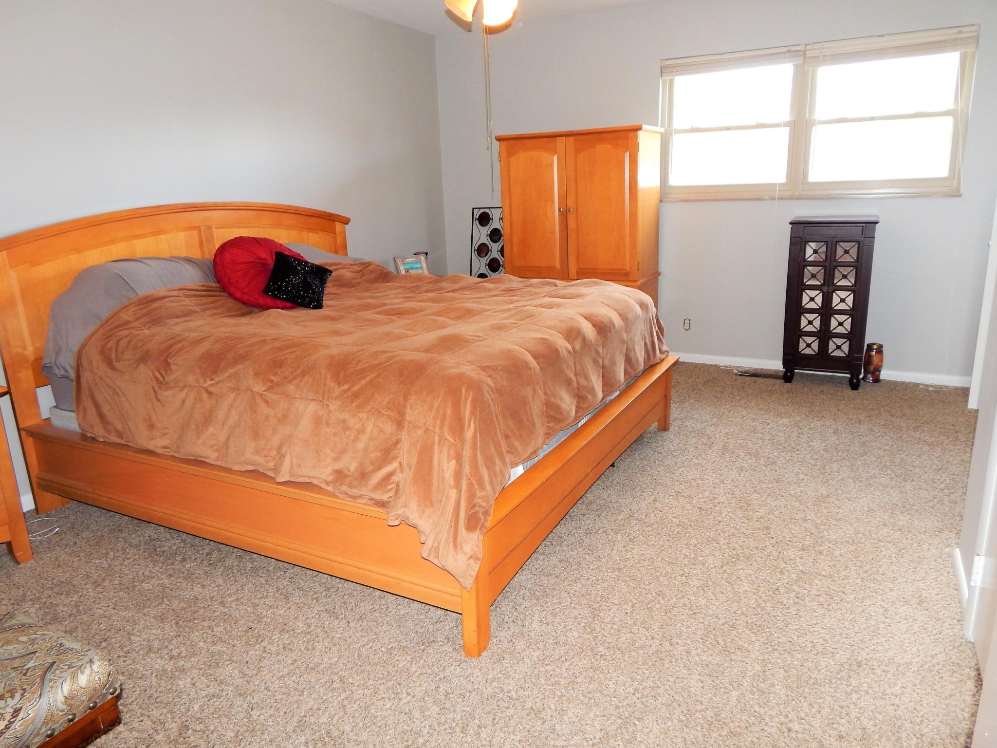 518 Gibbs Ferry Road Clinton, TN 37716 - Photo 17 of 25 a bed sitting in a bedroom next to a window