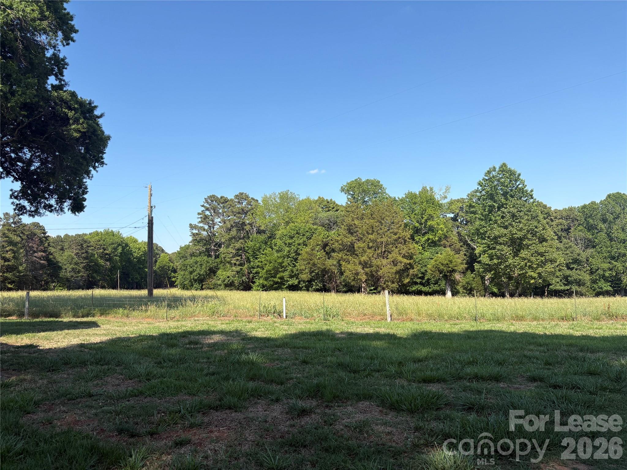 6625 Long Road Matthews, NC 28104 - Photo 20 of 21 a view of a grassy area