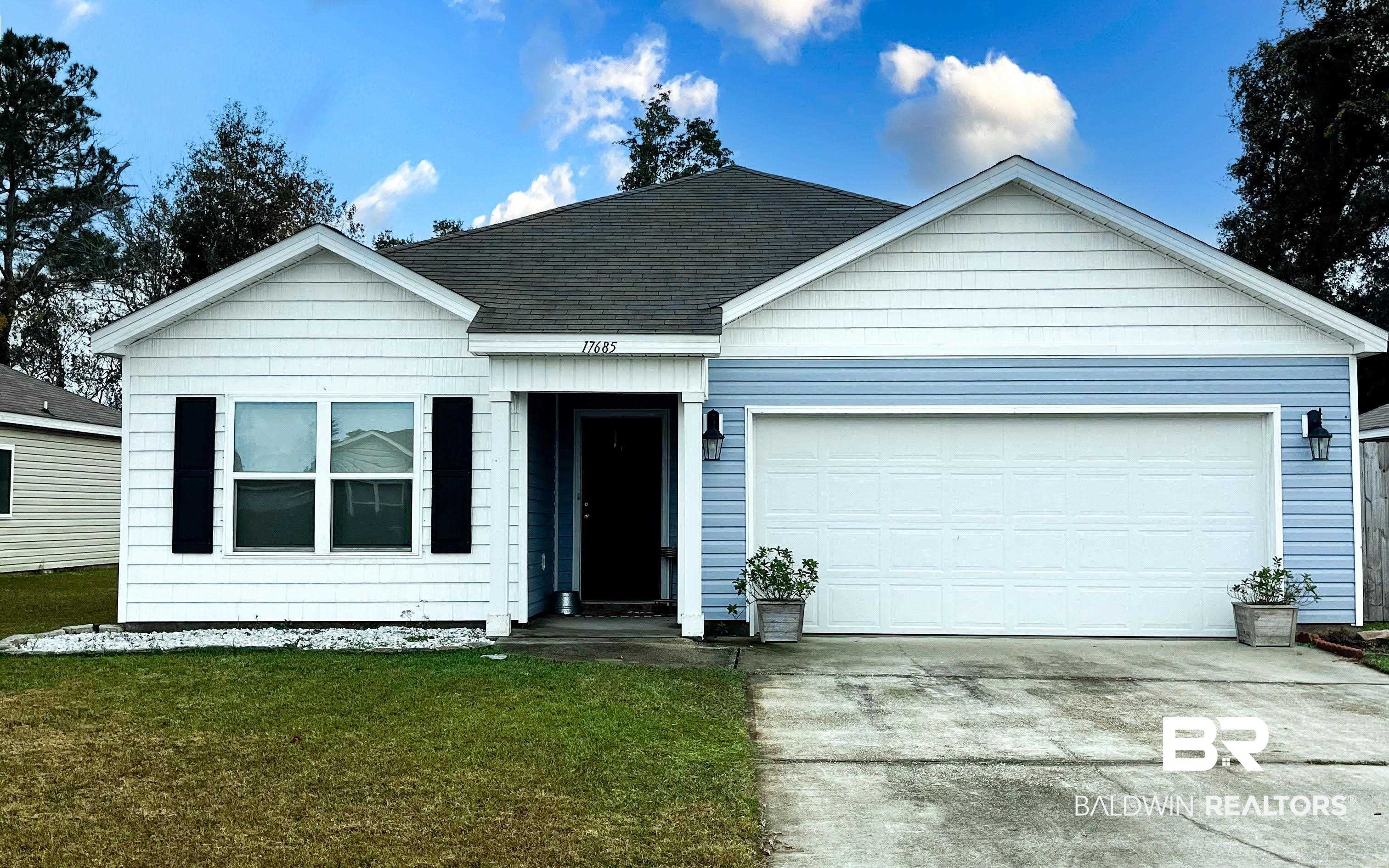 17685 Lewis Smith Drive Foley, AL 36535 - Photo 1 of 1 Ranch-style home with a garage and a front yard