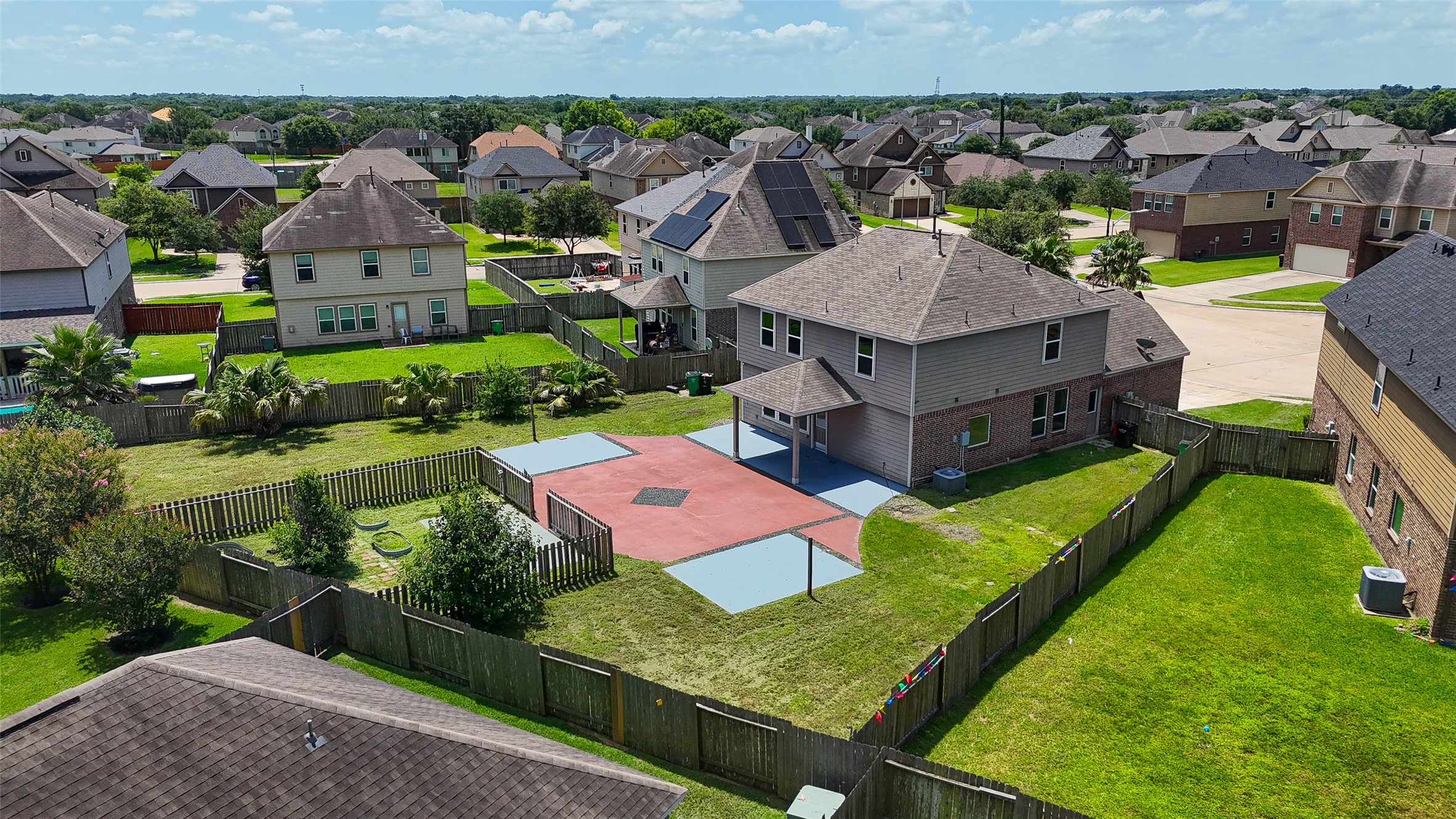 2702 Modano Court Fresno, TX 77545 - Photo 45 of 46 an aerial view of a house with a garden