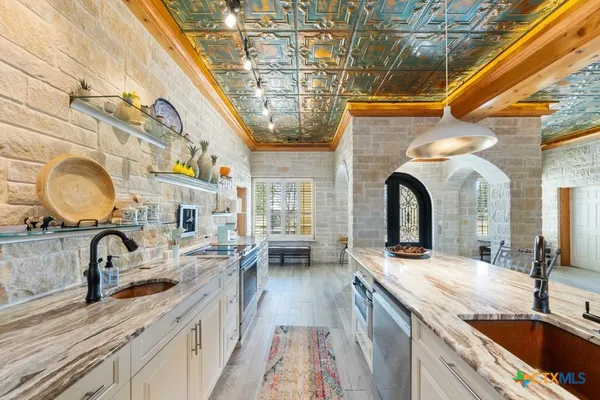 a bedroom with furniture and a ceiling fan