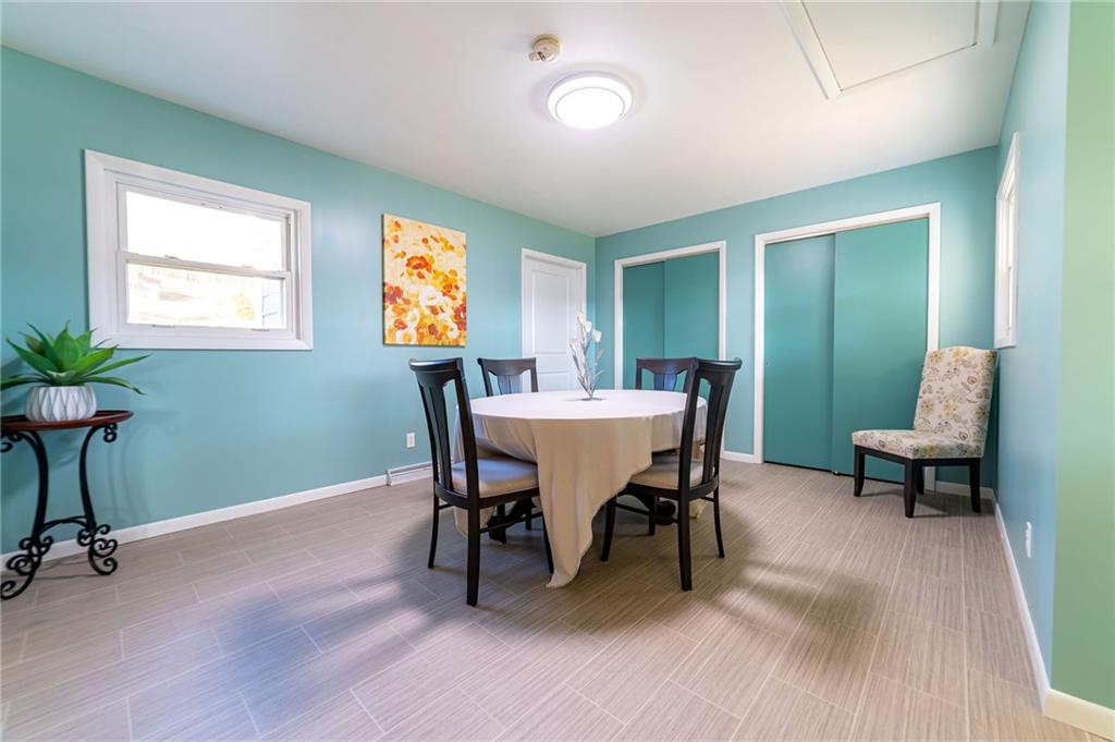 708 Middle 1st Street Rural Valley, PA 16249 - Photo 11 of 22 a view of a dining room with furniture and wooden floor