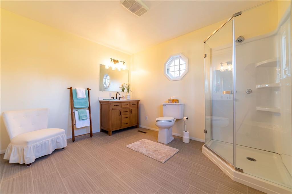 708 Middle 1st Street Rural Valley, PA 16249 - Photo 13 of 22 a spacious bathroom with a double vanity sink and a mirror