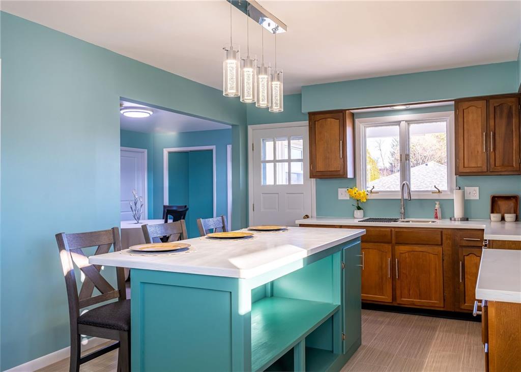 708 Middle 1st Street Rural Valley, PA 16249 - Photo 7 of 22 a dining hall with a sink and a large window