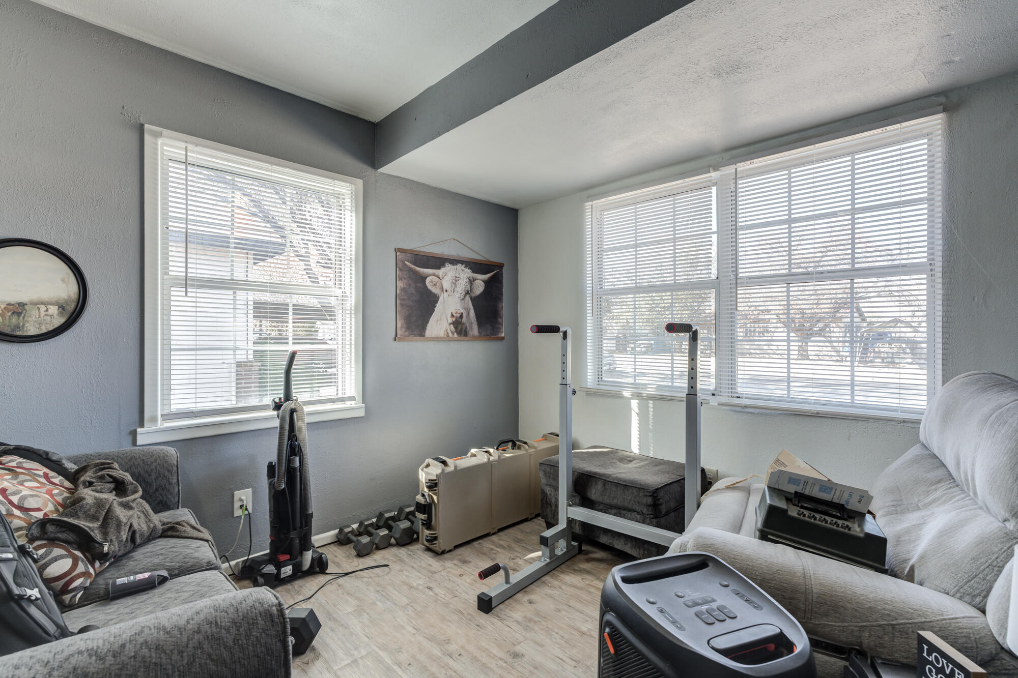 4503 45th Street Lubbock, TX 79414 - Photo 13 of 27 a living room with furniture and a window