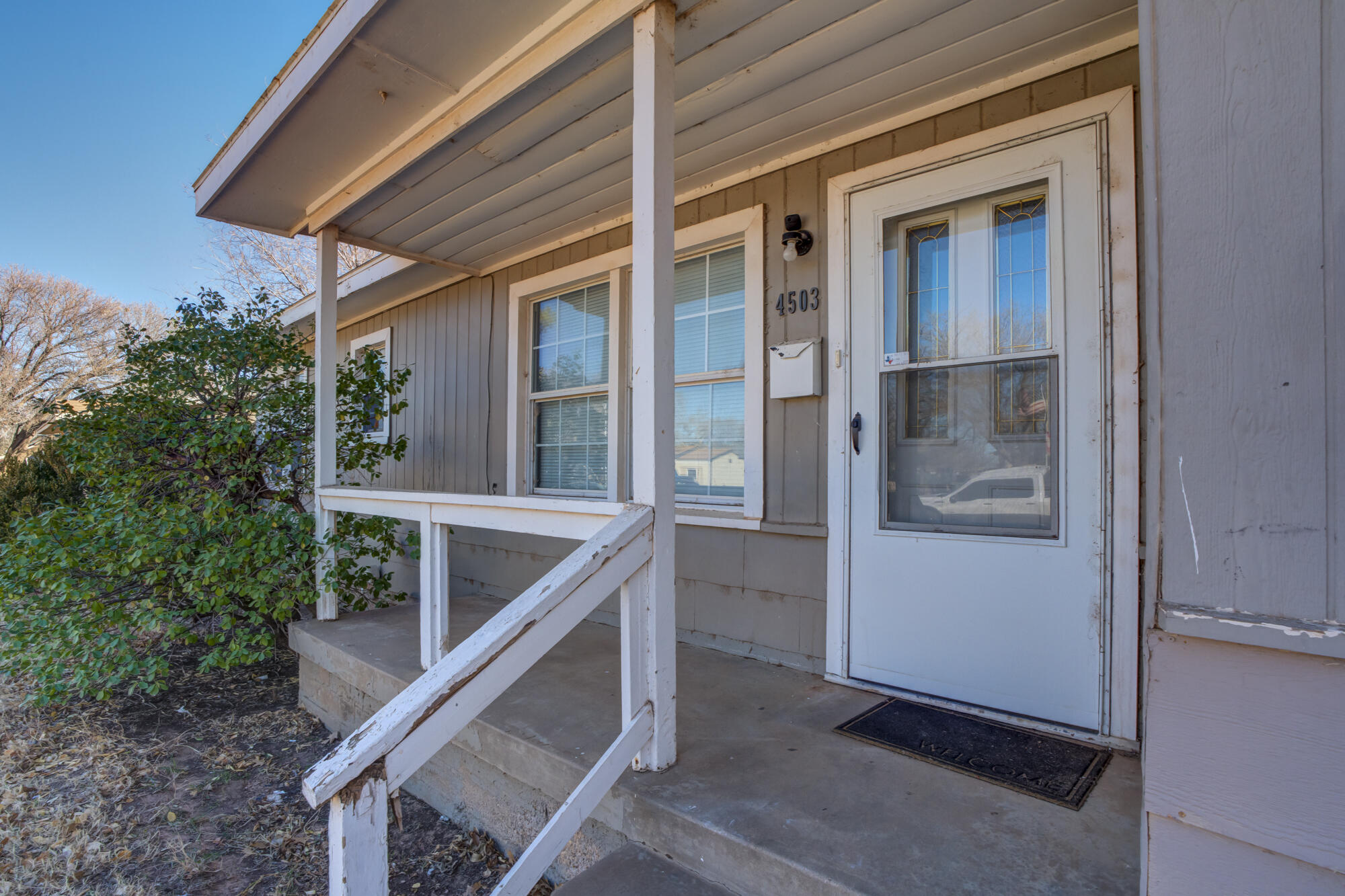 4503 45th Street Lubbock, TX 79414 - Photo 2 of 27 a view of an entryway with staircase