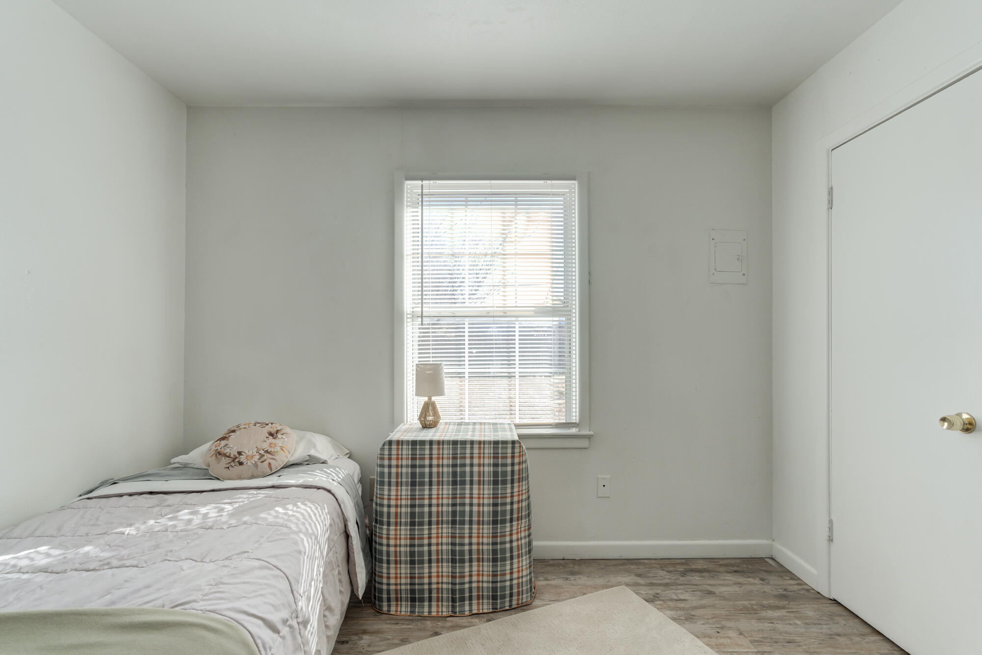 4503 45th Street Lubbock, TX 79414 - Photo 21 of 27 a bedroom with a bed and window