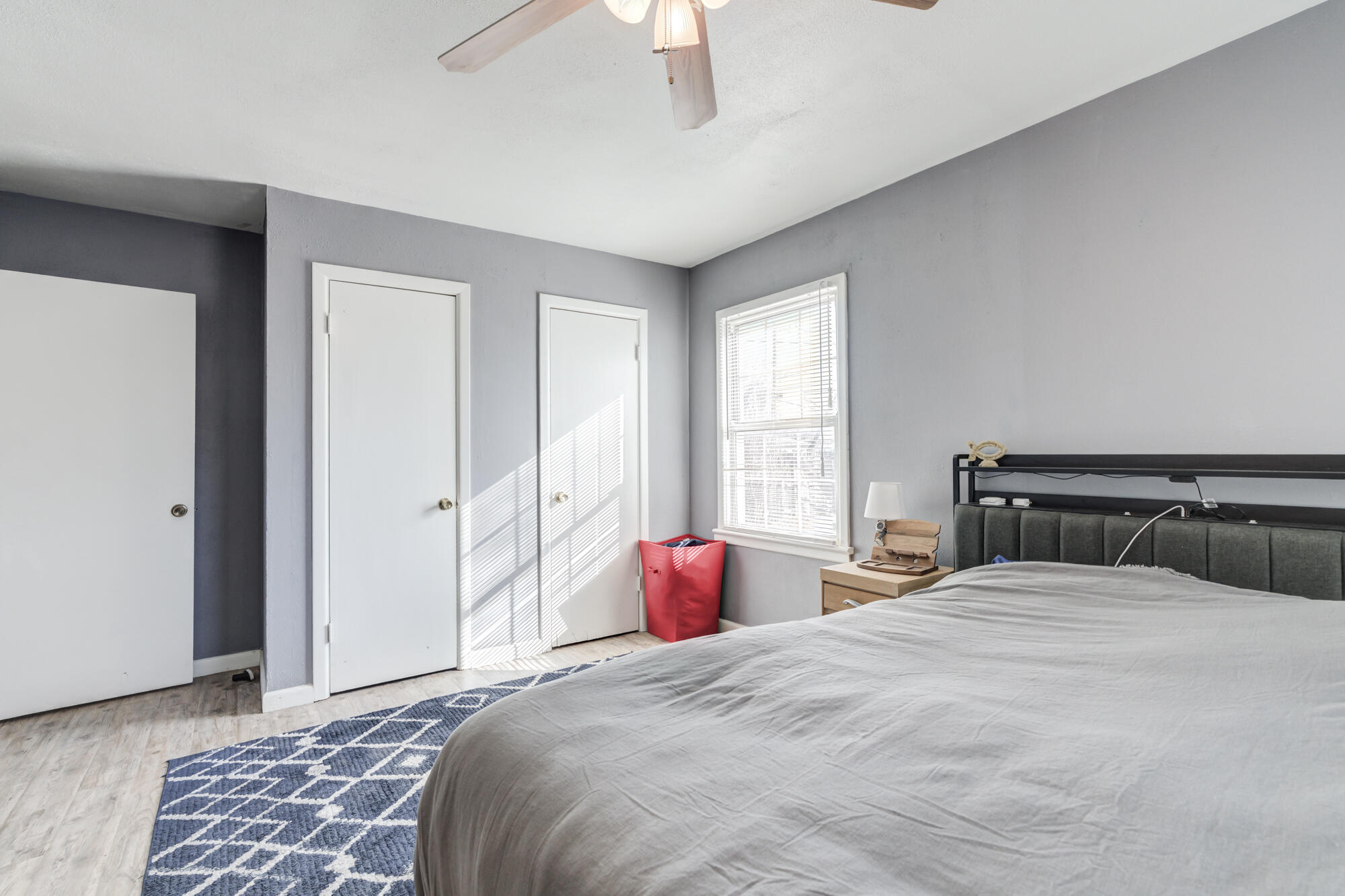 4503 45th Street Lubbock, TX 79414 - Photo 24 of 27 a bedroom with a bed and window