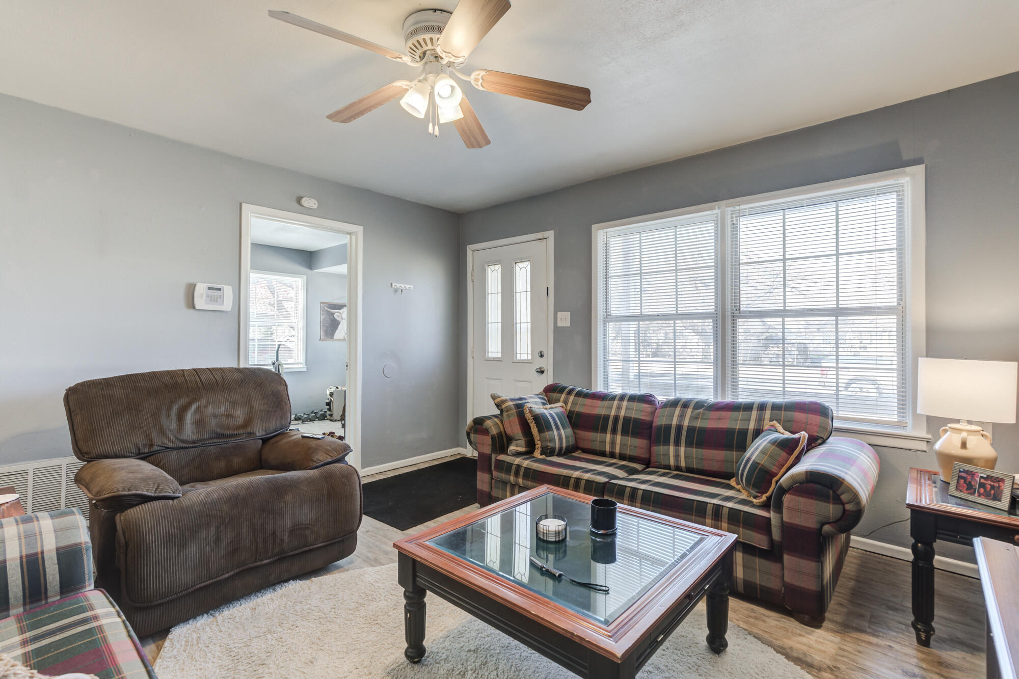 4503 45th Street Lubbock, TX 79414 - Photo 5 of 27 a living room with furniture and a large window