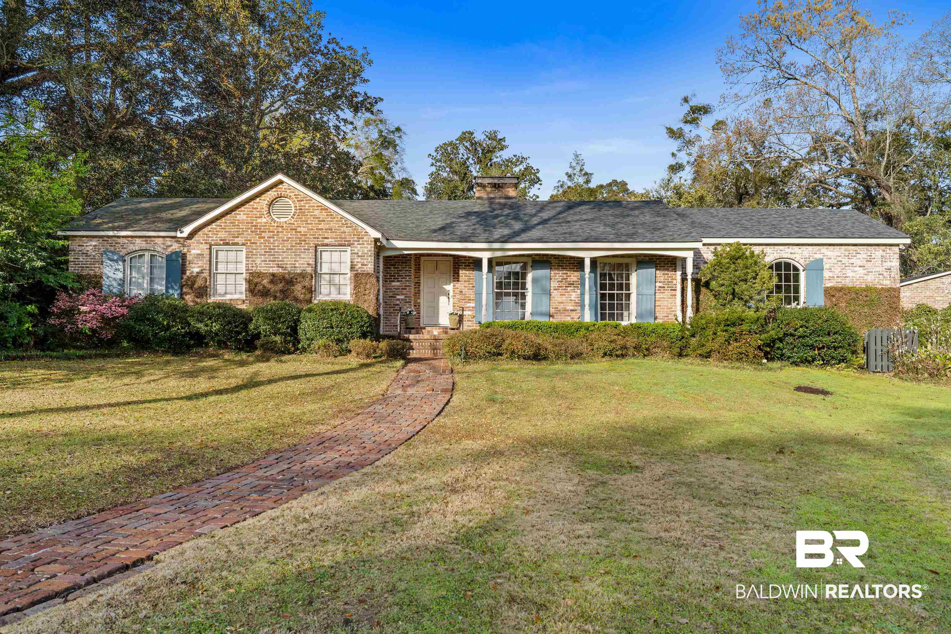 141 Myrtlewood Lane Mobile, AL 36608 - Photo 1 of 44 Ranch-style home with a front yard and brick siding