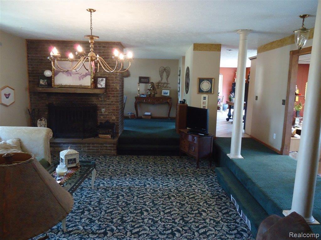 10550 West Sargent Road Fowlerville, MI 48836 - Photo 2 of 22 Formal Living Rm w/Fireplace