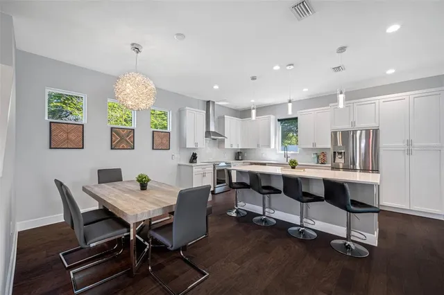 a bathroom with a shower a toilet and a sink