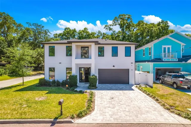 a living room with kitchen island furniture and a wooden floor