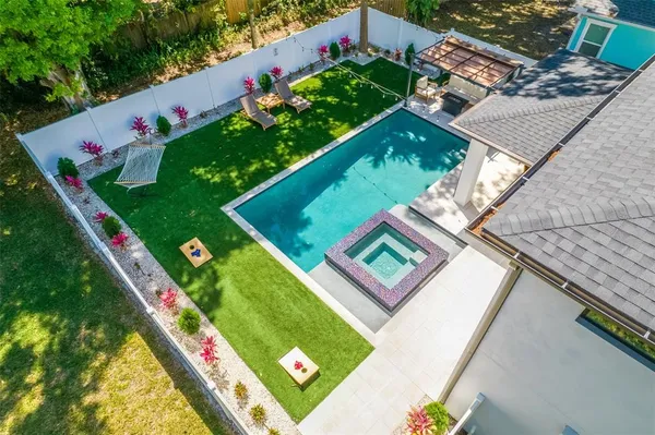 a view of kitchen with furniture and wooden floor