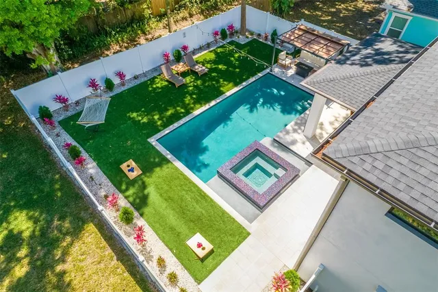 a view of kitchen with furniture and wooden floor