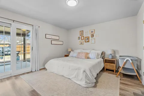 a view of work space with furniture and windows