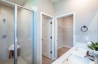5900 Southwest 112th Pl Road Ocala, FL 34476 - Photo 8 of 17 a bathroom with a tub and shower