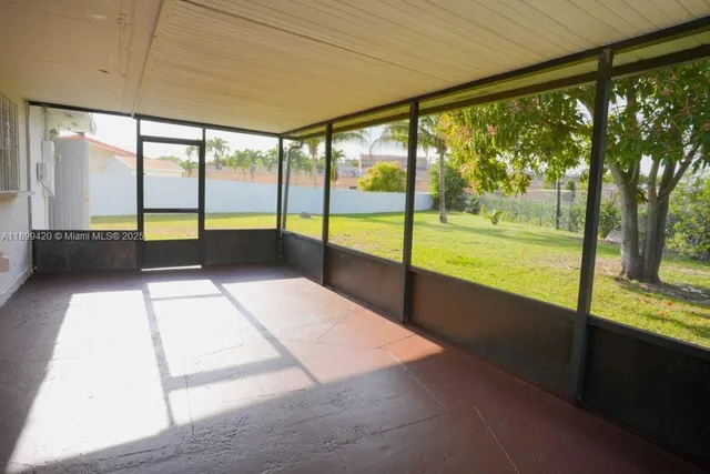 a kitchen with stainless steel appliances granite countertop a refrigerator a stove top oven a sink and dishwasher