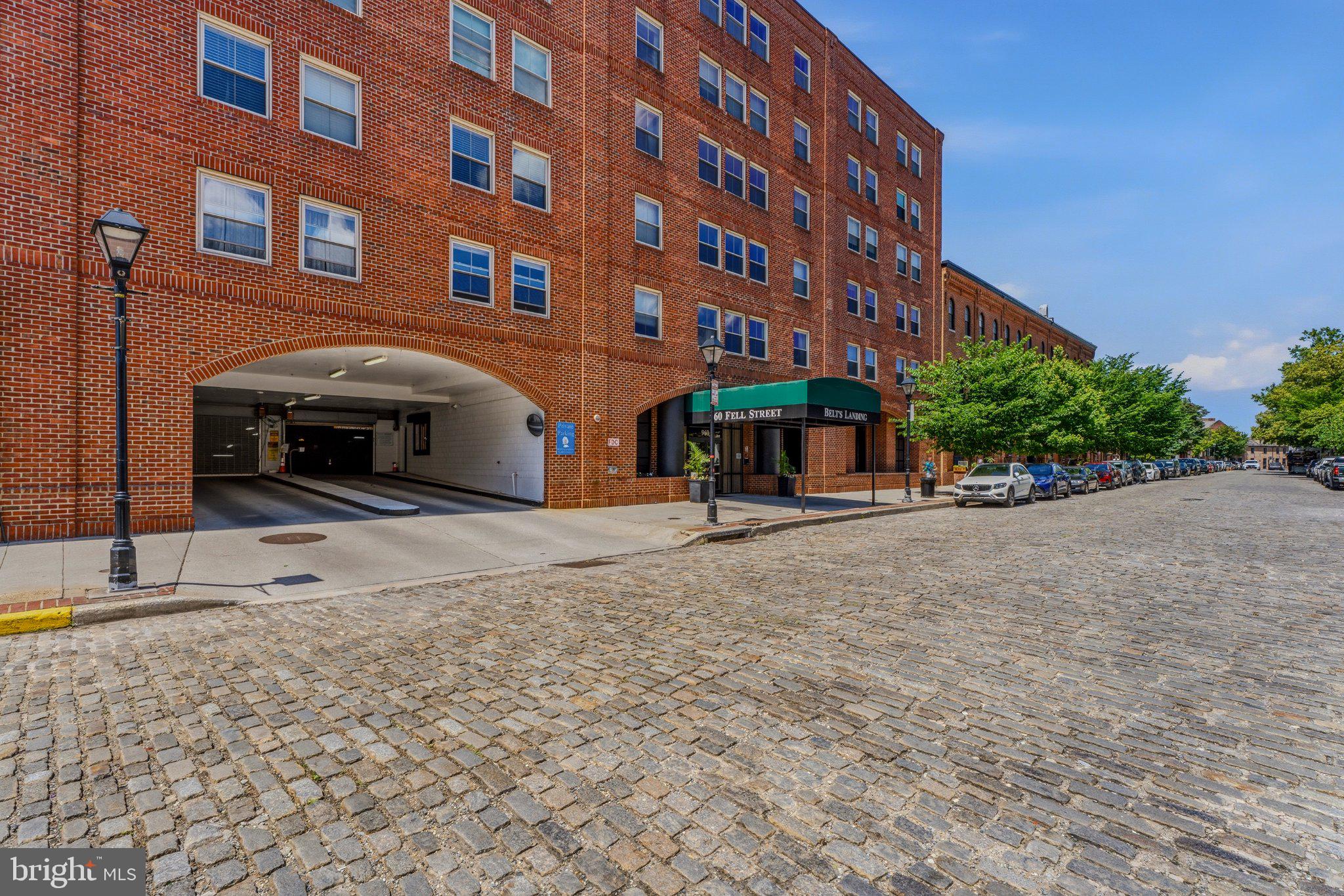 960 Fell Street, Unit 308 Baltimore, MD 21231 - Photo 2 of 38 Charming brick facade in urban setting.