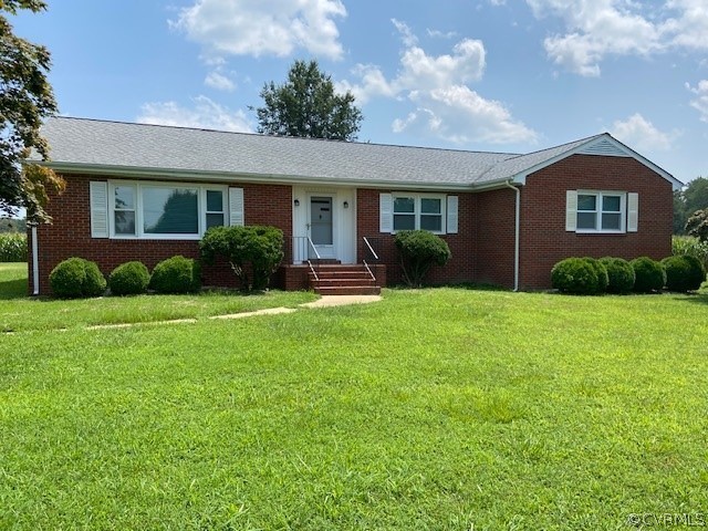 11370 Hanover Courthouse Road Hanover, VA 23069 - Photo 1 of 37 a front view of a house with garden and porch