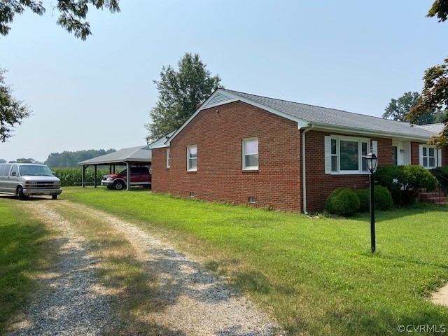 11370 Hanover Courthouse Road Hanover, VA 23069 - Photo 5 of 37 a front view of a house with a yard