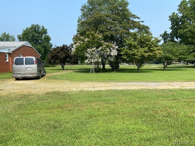 11370 Hanover Courthouse Road Hanover, VA 23069 - Photo 6 of 37 a front view of a house with a yard